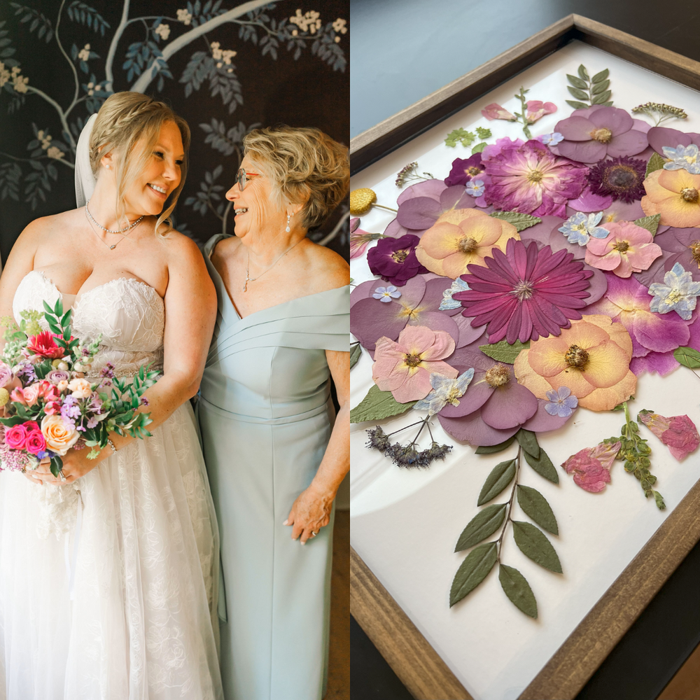 On the left, the bride smiles joyfully as she shares a moment with her mother. She holds a colorful bouquet filled with roses, lavender, and other vibrant blooms, and wears a strapless lace wedding dress. Her mother, in a soft blue gown, smiles back warmly. On the right, the pressed floral artwork reflects the bouquet's colors, with soft purples, pinks, and yellows. The art highlights delicate petals and leaves, arranged beautifully in a natural frame, capturing the essence of the bouquet in a lasting tribu