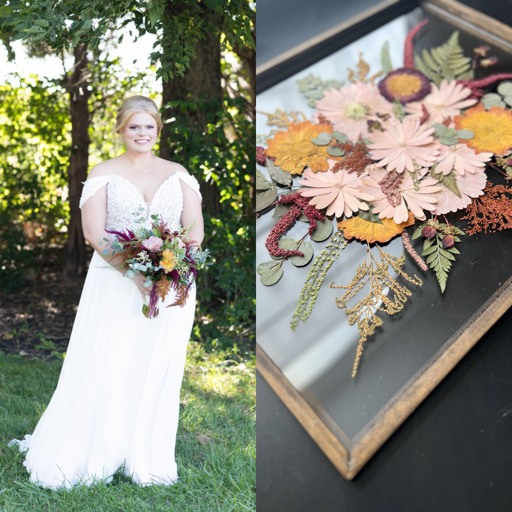 On the left, a bride smiles while holding her autumn-inspired bouquet, filled with vibrant blooms in shades of orange, yellow, pink, and deep burgundy, surrounded by lush greenery. The sun shines brightly, creating a warm atmosphere. On the right, the pressed floral art showcases the same flowers from her bouquet, arranged beautifully in a black-framed art piece. The composition features a blend of pink, orange, and yellow daisies, with textured greenery and deep red accents.